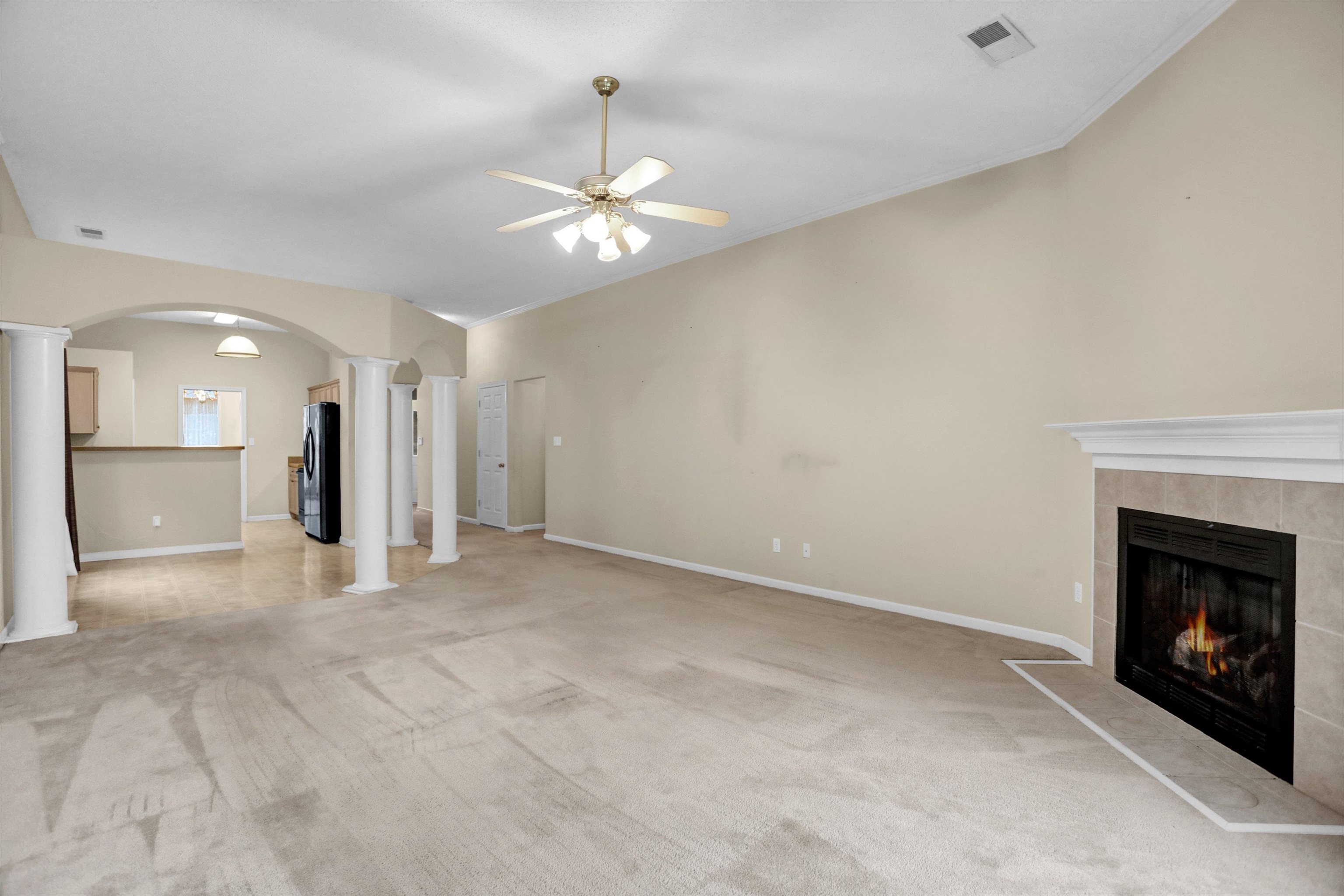 2159 Purple Leaf Lane Memphis, TN 38016 - Photo 2 of 14 a view of an empty room with a fireplace