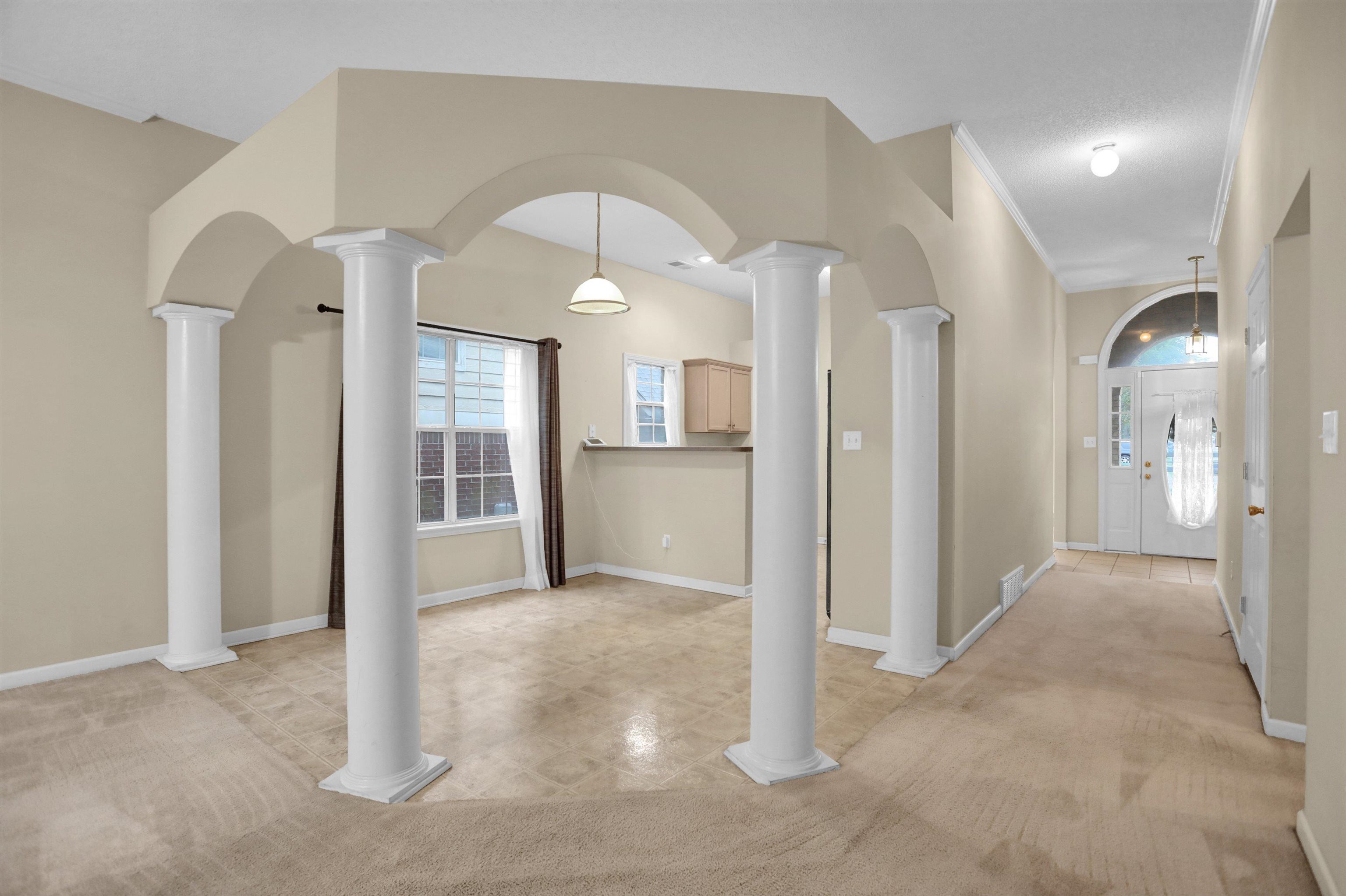 2159 Purple Leaf Lane Memphis, TN 38016 - Photo 3 of 14 a view of a hallway with wooden cabinet and a large mirror