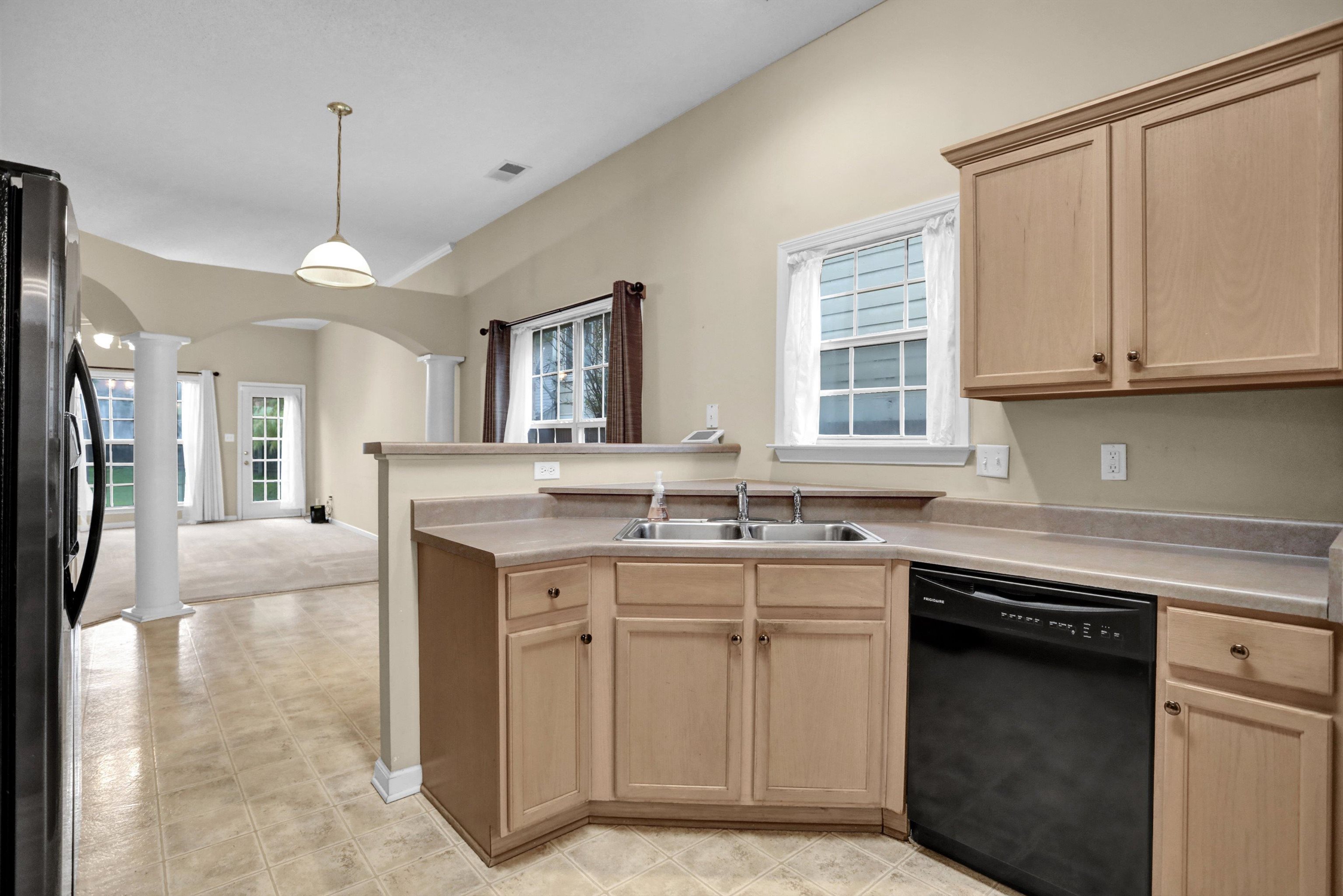 2159 Purple Leaf Lane Memphis, TN 38016 - Photo 4 of 14 a kitchen with a sink stove and cabinets