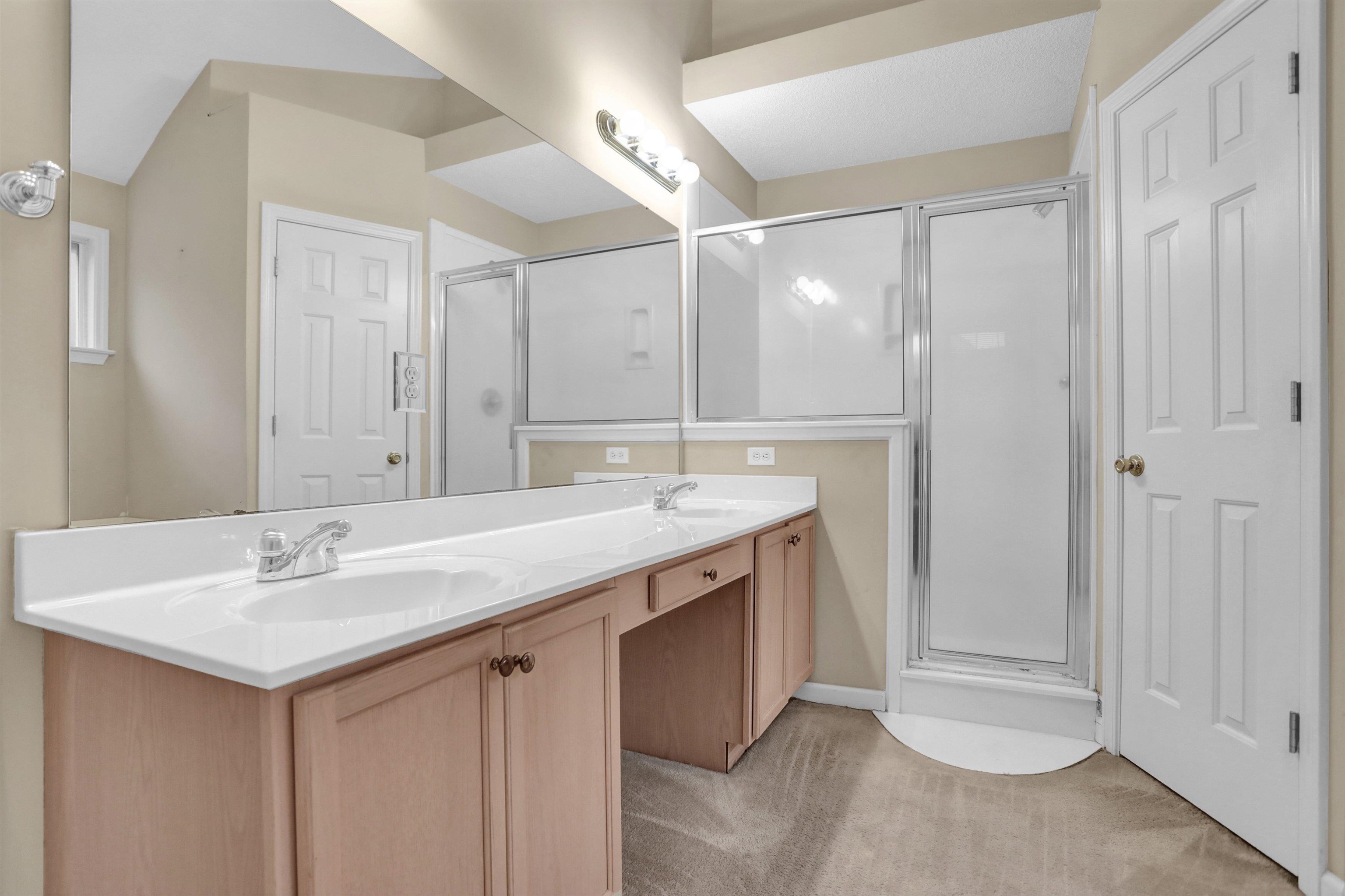 2159 Purple Leaf Lane Memphis, TN 38016 - Photo 9 of 14 a bathroom with a sink and a mirror