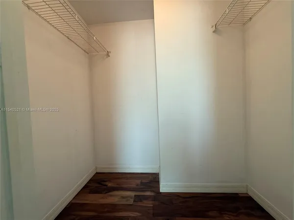 a view of small space with racks on the wall