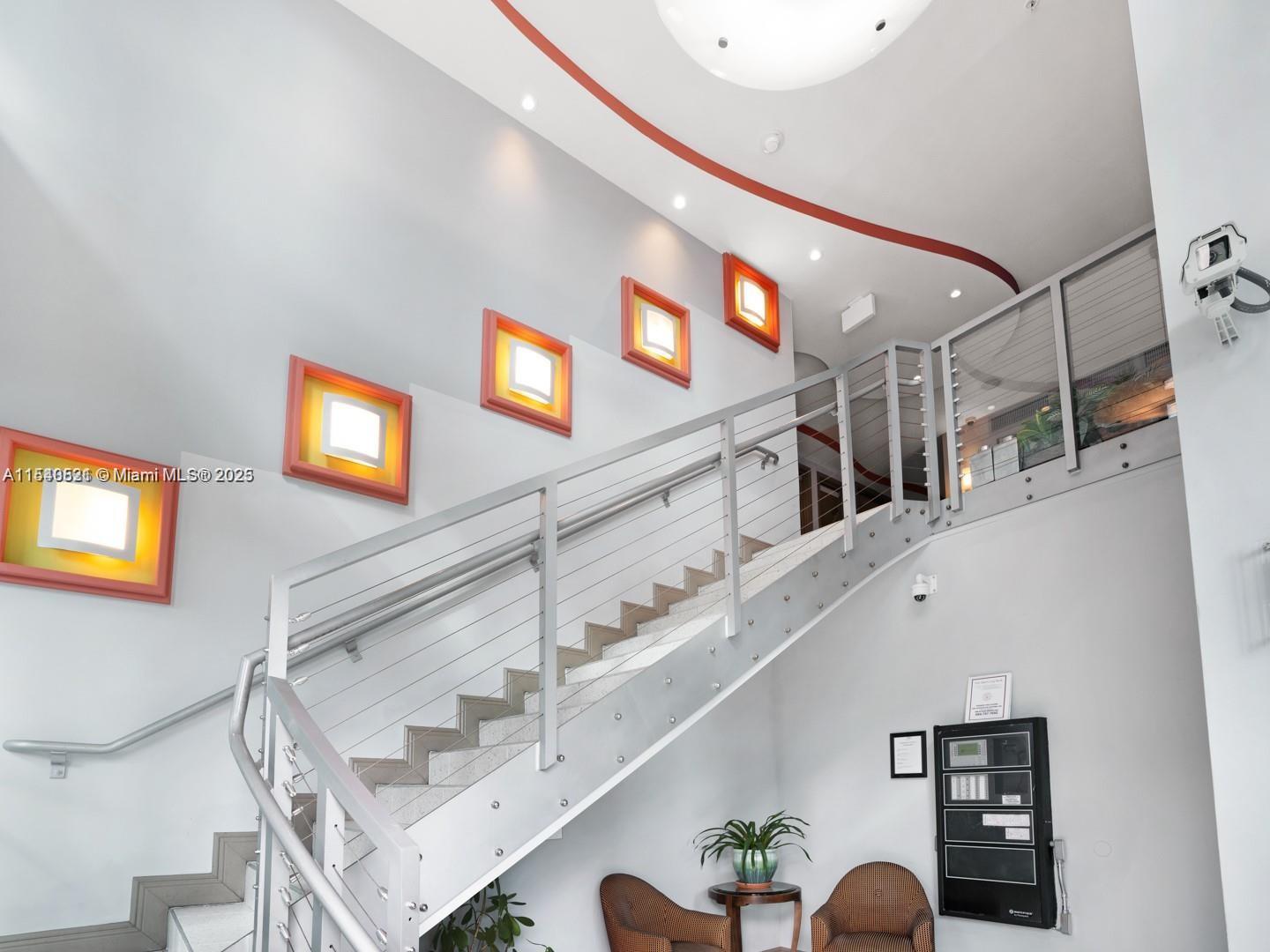 9201 Collins Avenue, Unit 1023 Surfside, FL 33154 - Photo 24 of 28 a view of entryway and hall