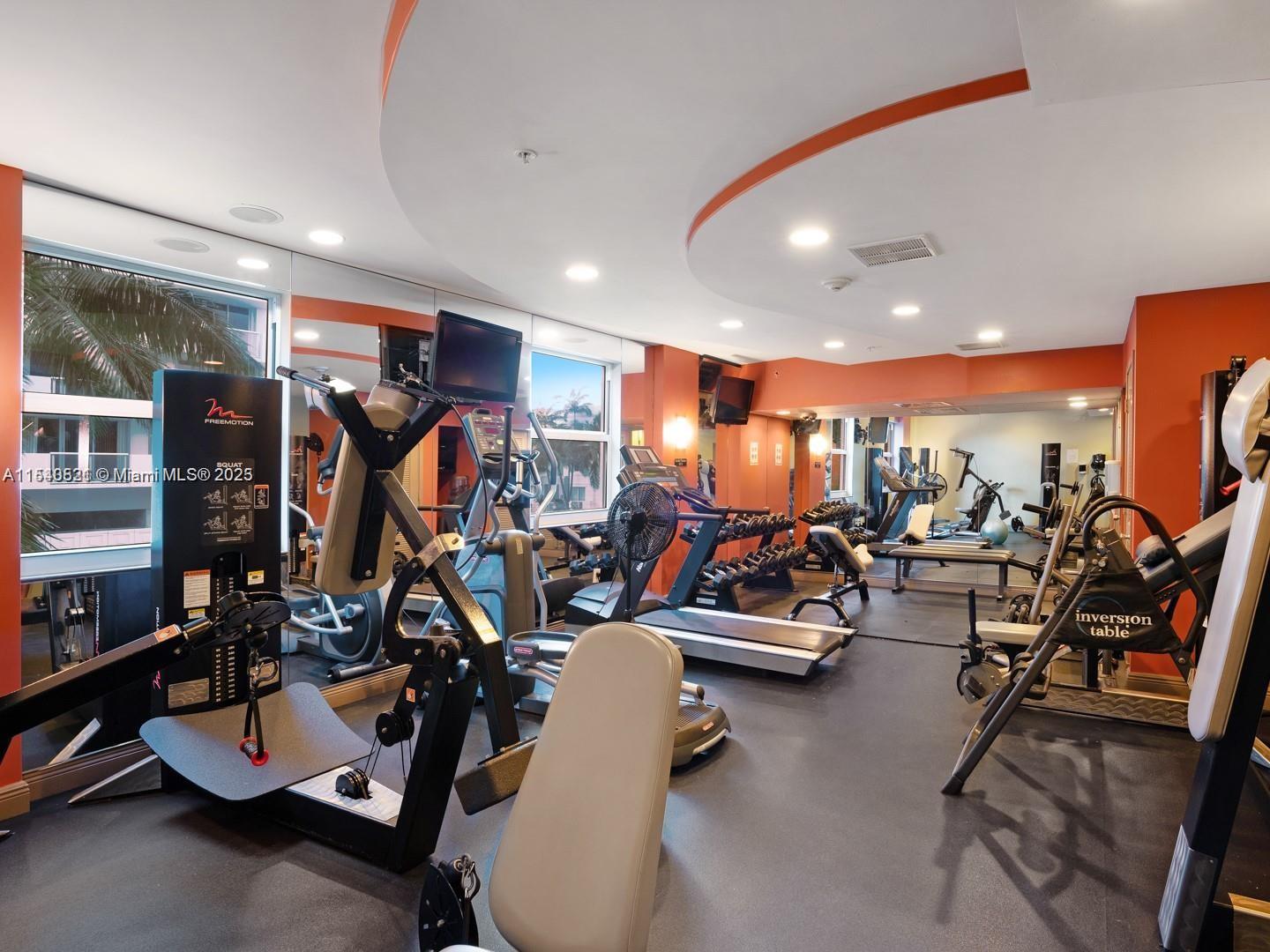 9201 Collins Avenue, Unit 1023 Surfside, FL 33154 - Photo 26 of 28 a view of a room with gym equipment
