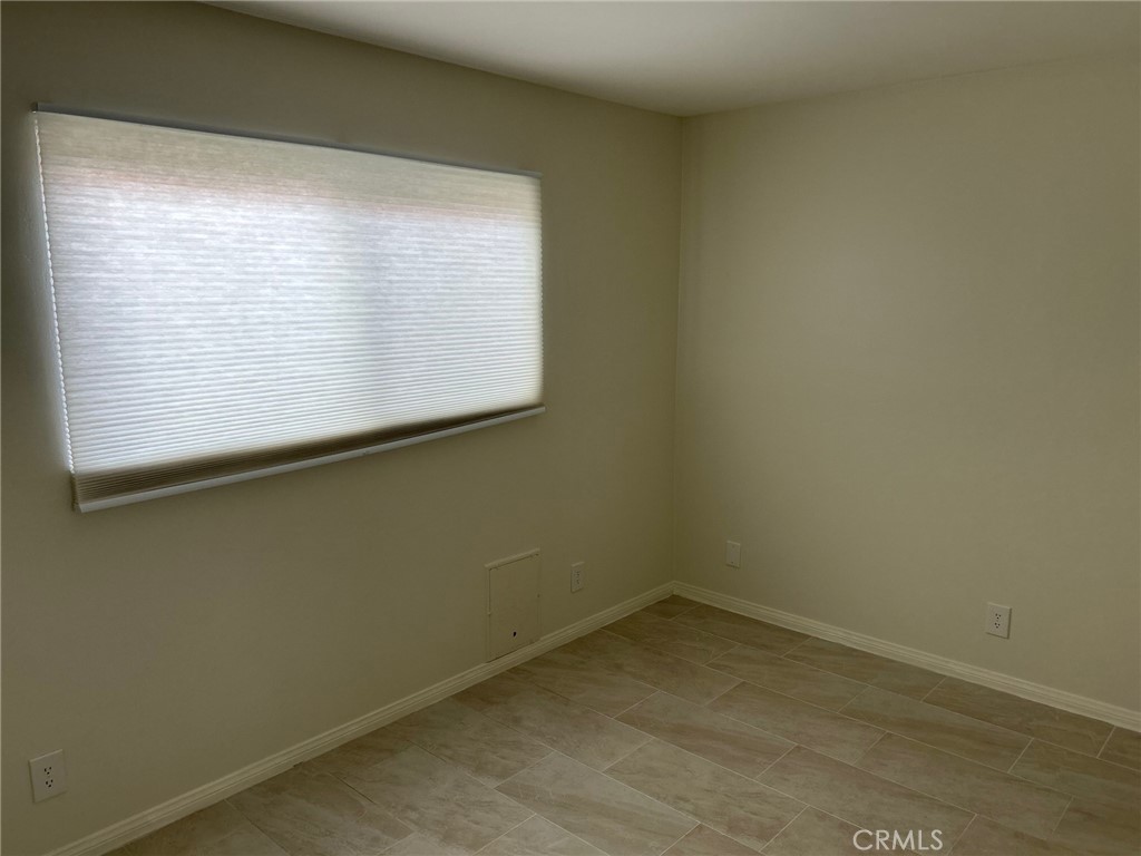 74443 Driftwood Drive, Unit 2 Palm Desert, CA 92260 - Photo 15 of 19 a view of a small space with window