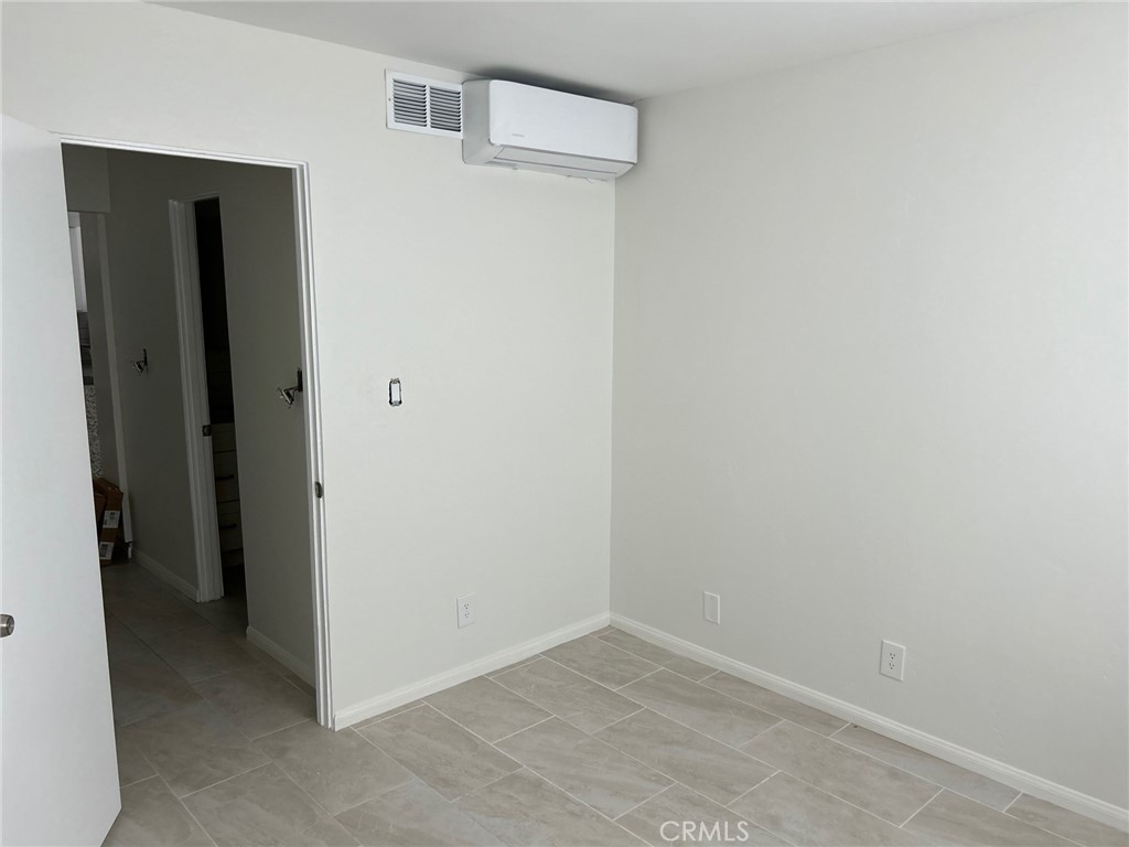 74443 Driftwood Drive, Unit 2 Palm Desert, CA 92260 - Photo 9 of 19 a view of an empty room