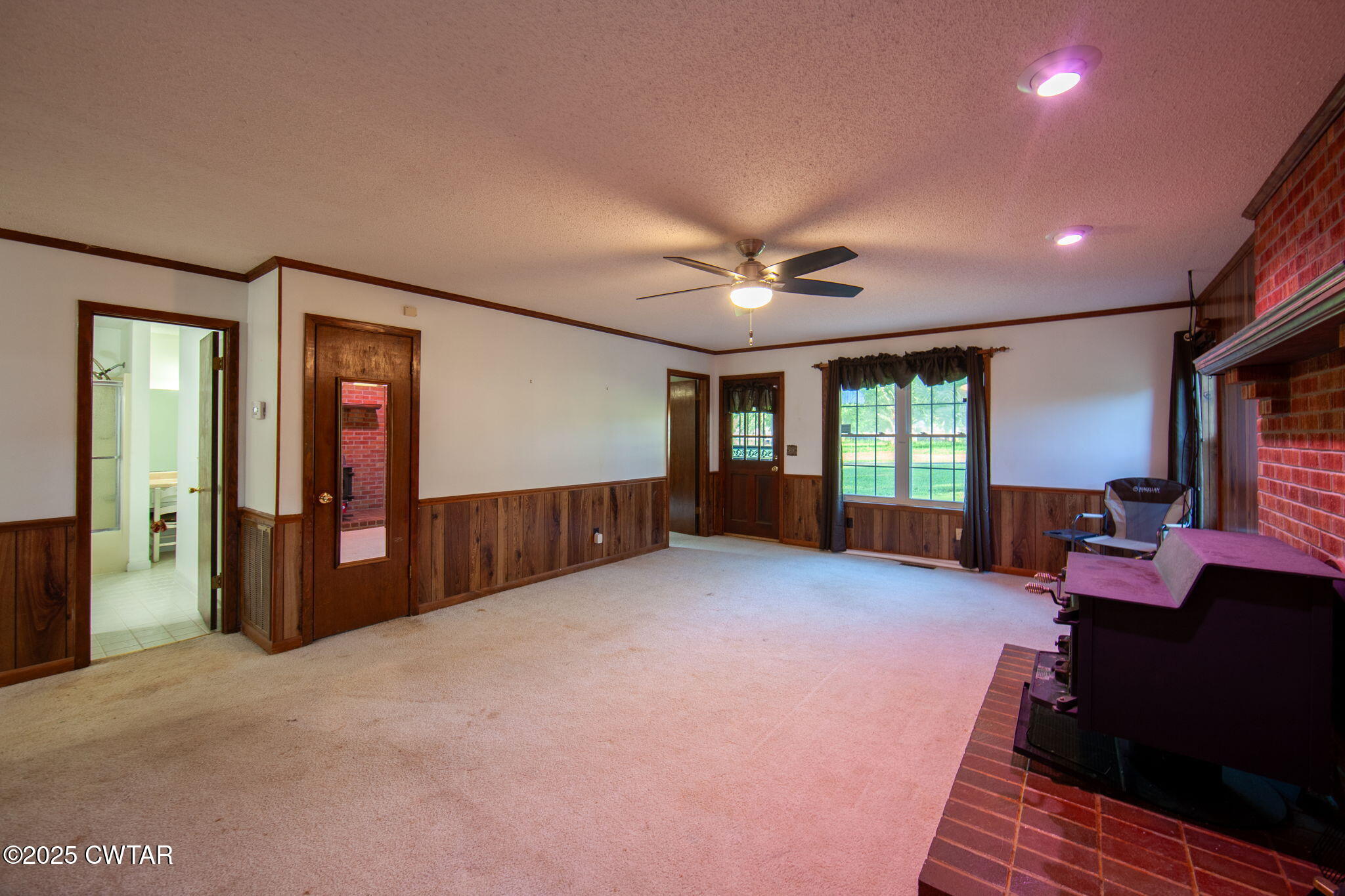 228 Gobelet Road Medon, TN 38356 - Photo 12 of 23 a view of a livingroom with furniture and a ceiling fan