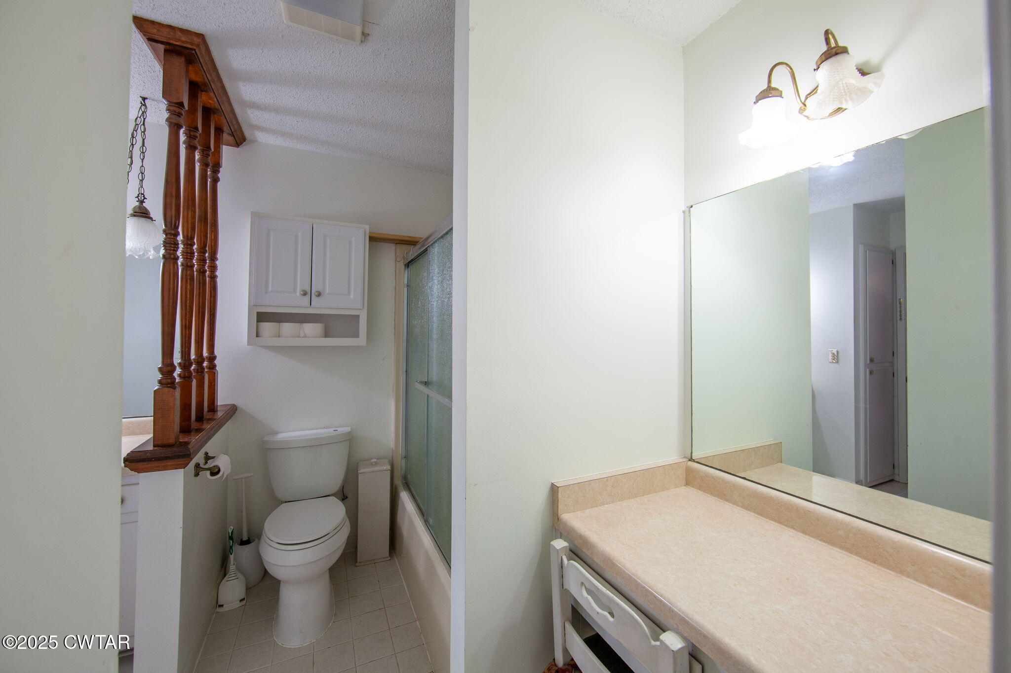 228 Gobelet Road Medon, TN 38356 - Photo 15 of 23 a bathroom with a granite countertop sink toilet and a mirror