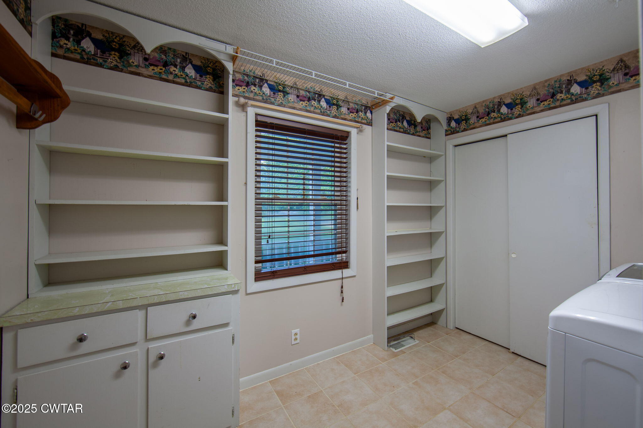 228 Gobelet Road Medon, TN 38356 - Photo 18 of 23 a view of walk in closet with empty racks