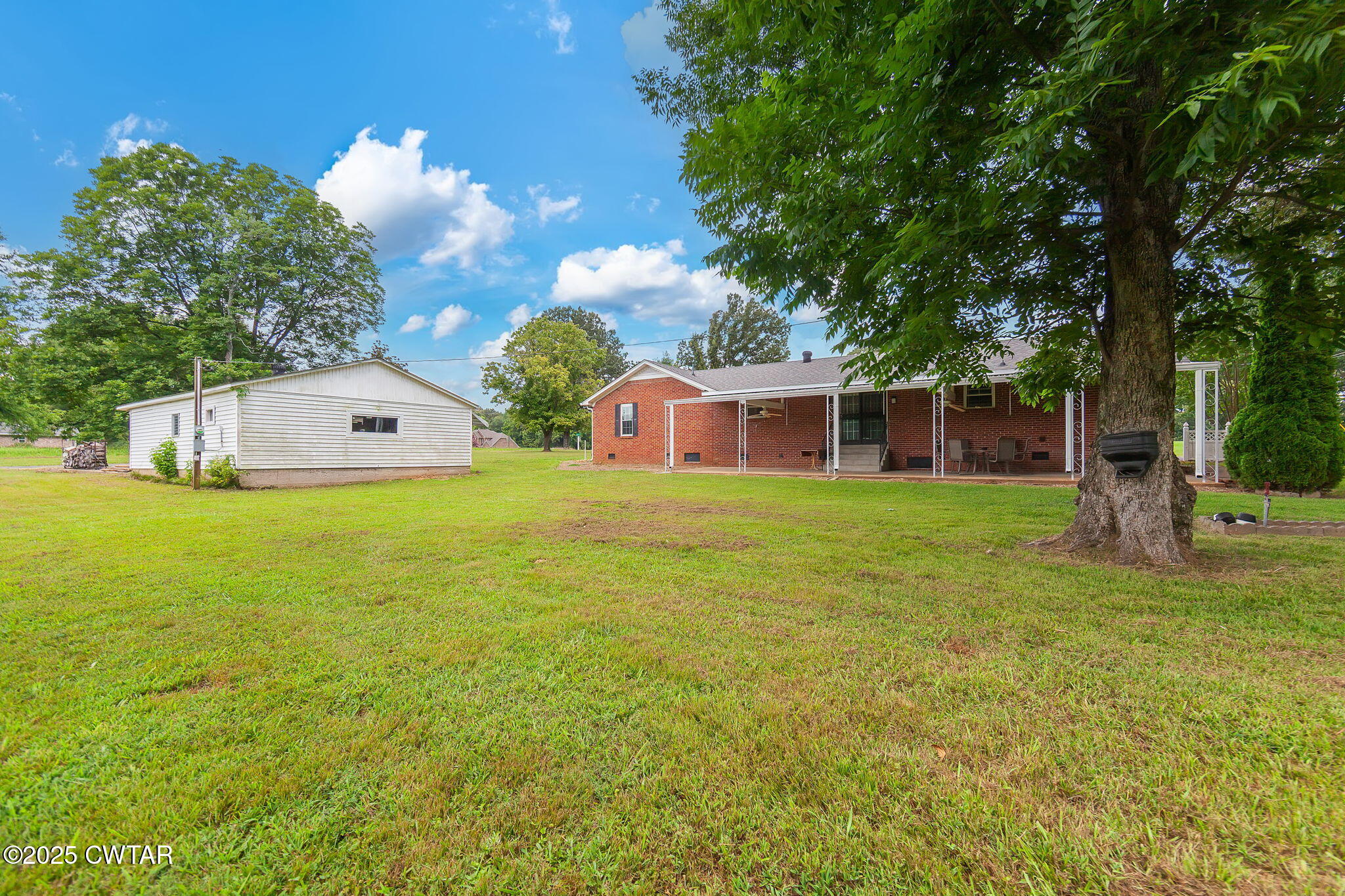 228 Gobelet Road Medon, TN 38356 - Photo 23 of 23 a front view of a house with garden