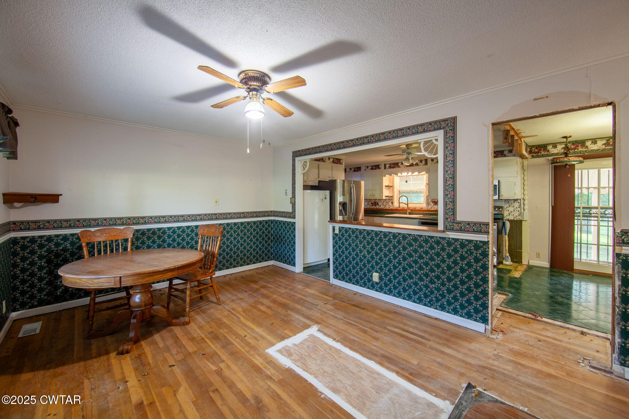 228 Gobelet Road Medon, TN 38356 - Photo 7 of 23 a bedroom with a bed and a chandelier