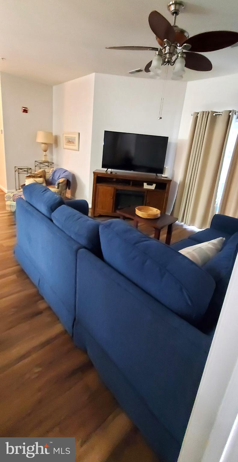 a living room with a couch and a flat screen tv