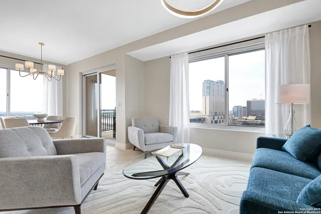 a kitchen with stainless steel appliances granite countertop a refrigerator stove and sink