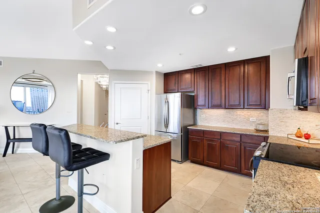 a view of a workspace with furniture