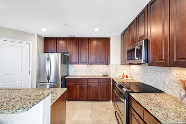 a view of workspace with furniture and window