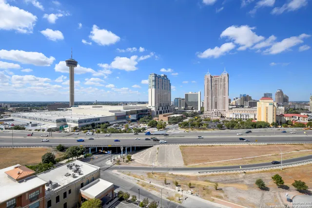 a view of a city with tall buildings