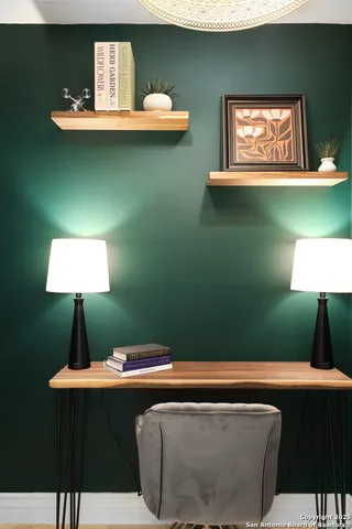 a view of a hallway with wooden shelves