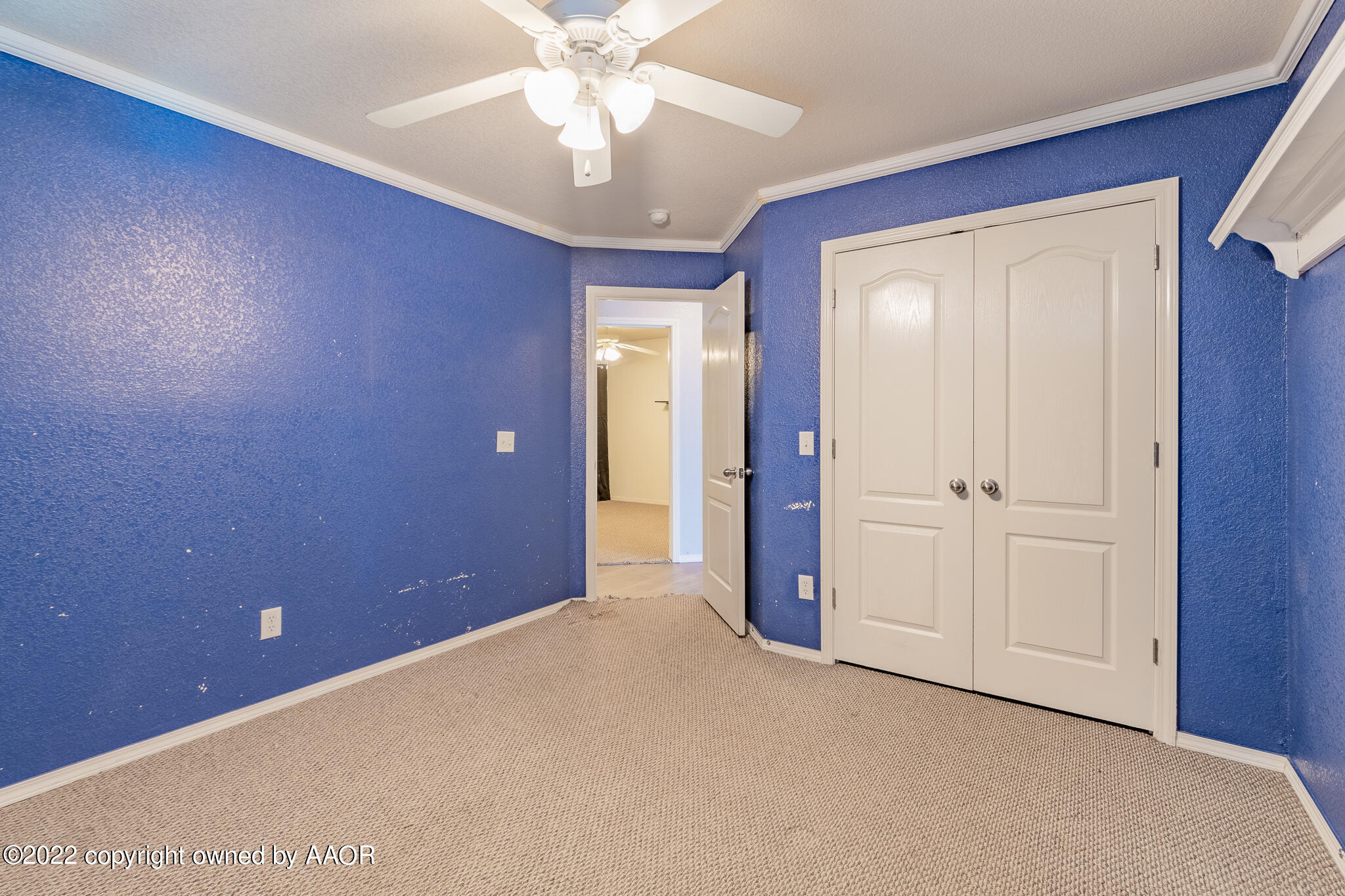4726 Capulin Lane Amarillo, TX 79110 - Photo 19 of 28 a view of a livingroom with a chandelier fan