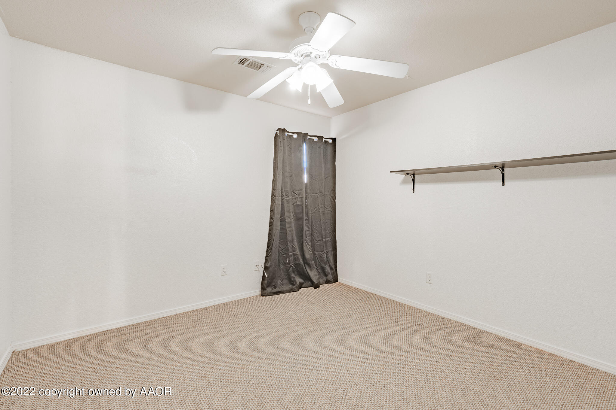 4726 Capulin Lane Amarillo, TX 79110 - Photo 23 of 28 wooden floor in an empty room