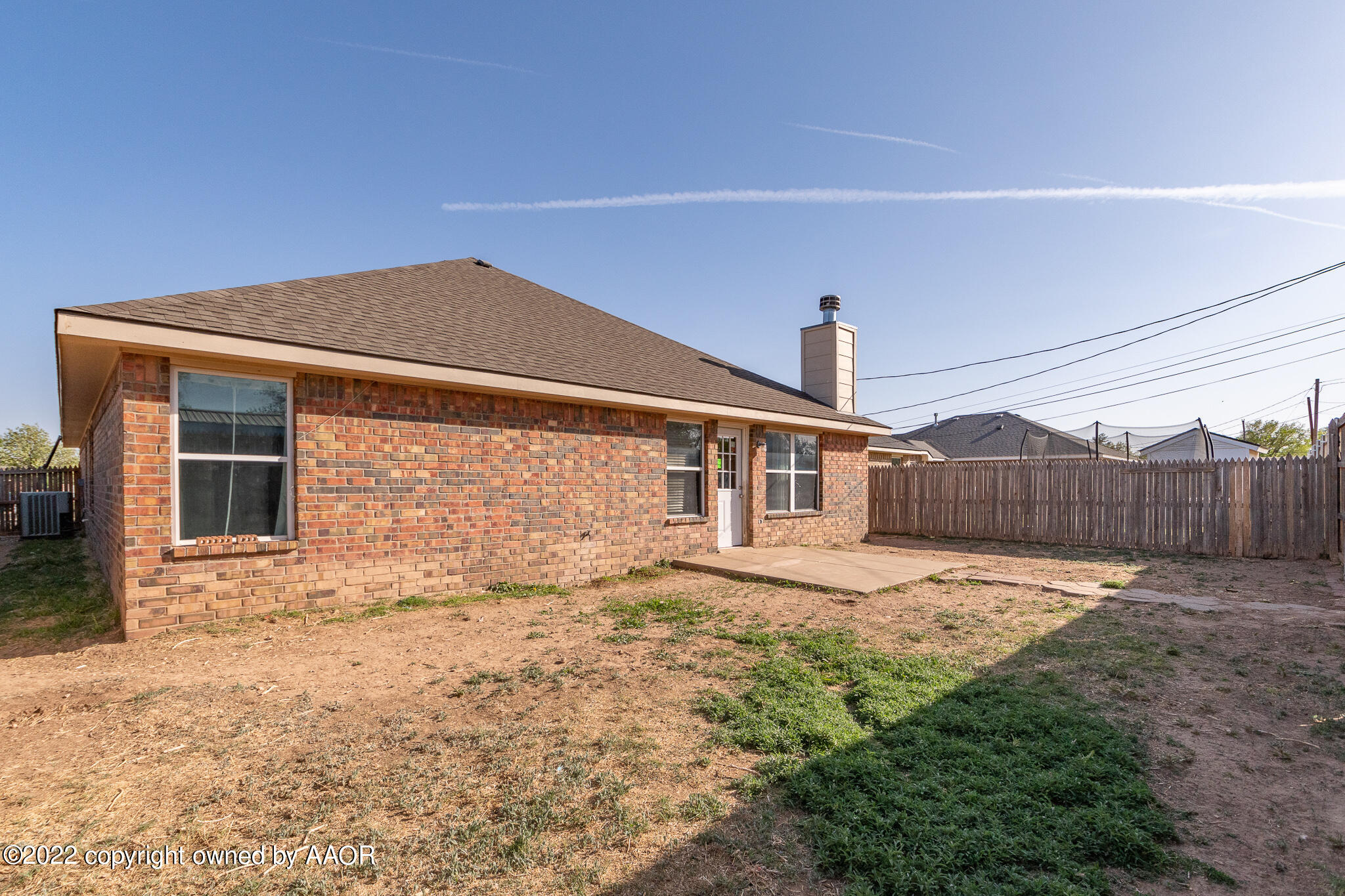 4726 Capulin Lane Amarillo, TX 79110 - Photo 28 of 28 a backyard of a house