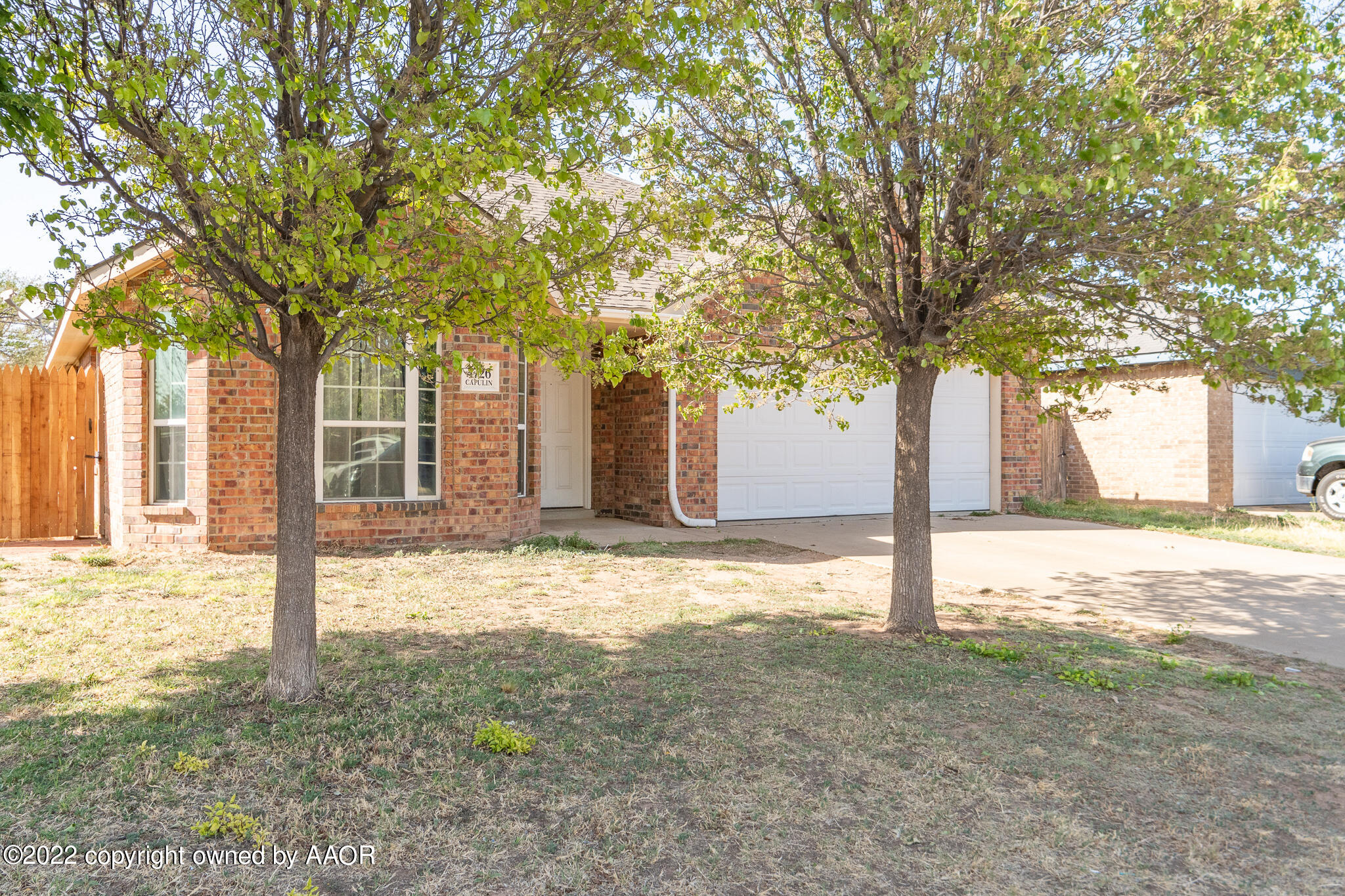 4726 Capulin Lane Amarillo, TX 79110 - Photo 3 of 28 a house with trees in front of it