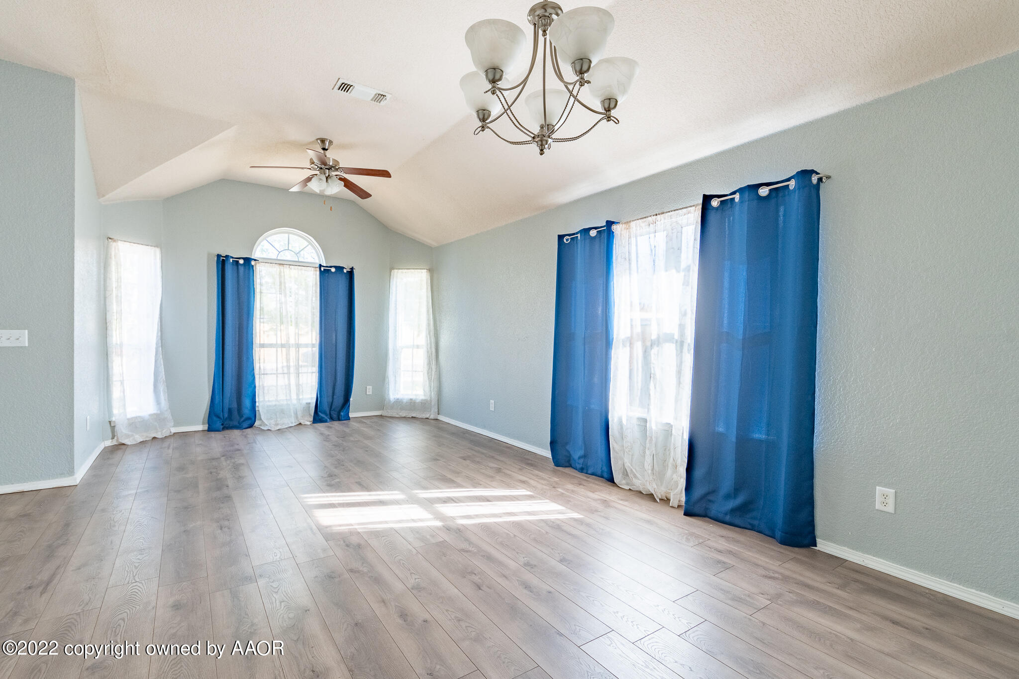 4726 Capulin Lane Amarillo, TX 79110 - Photo 6 of 28 a view of an empty room with a window