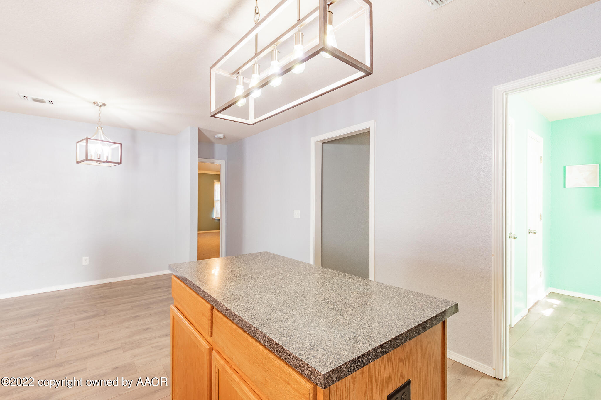 4726 Capulin Lane Amarillo, TX 79110 - Photo 10 of 28 a view of kitchen island