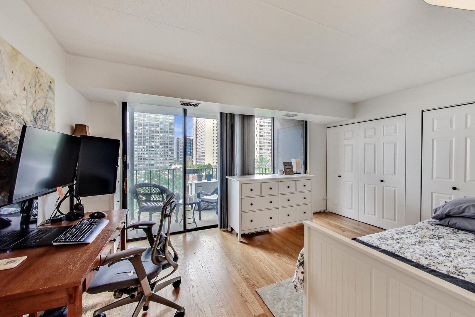651 West Sheridan Road, Unit 7C Chicago, IL 60613 - Photo 19 of 27 a view of a workspace with furniture and a window