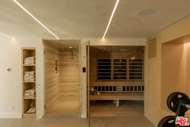 a projector room with furniture and a projector screen