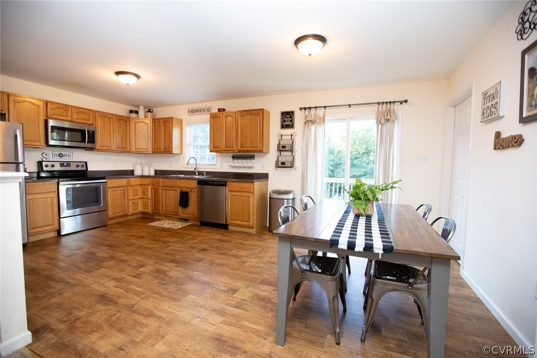 135 Mil-Scott Road Farmville, VA 23901 - Photo 15 of 46 a view of kitchen with sink dining table and chairs