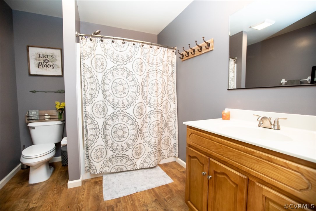 135 Mil-Scott Road Farmville, VA 23901 - Photo 22 of 46 a view of bathroom with a toilet sink and mirror