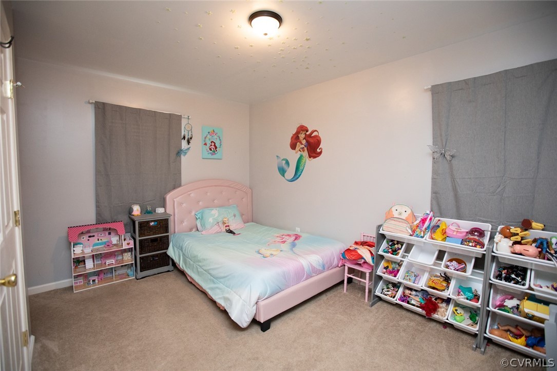 135 Mil-Scott Road Farmville, VA 23901 - Photo 26 of 46 a bedroom with baby bed and a window