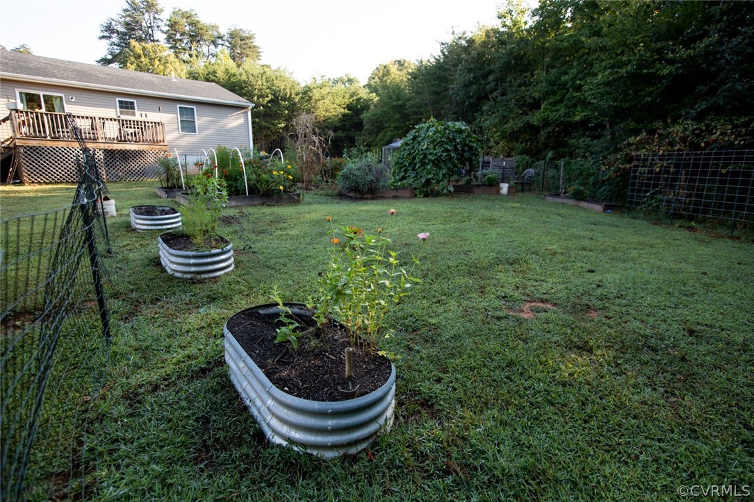 135 Mil-Scott Road Farmville, VA 23901 - Photo 44 of 46 a house view with a garden space