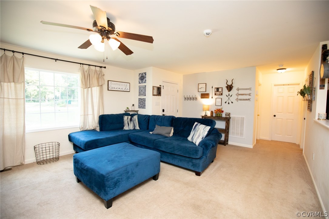 135 Mil-Scott Road Farmville, VA 23901 - Photo 6 of 46 a living room with furniture and a large window