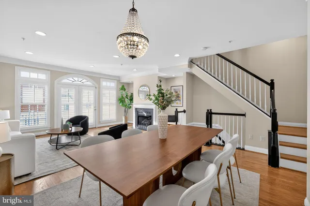 a white toilet sitting next to a small bathroom
