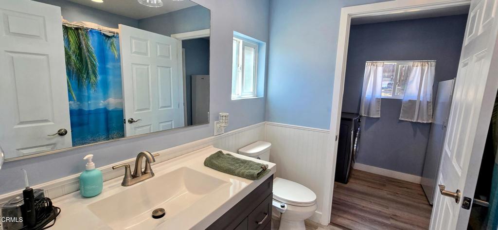 1834 East Carson Mesa Road Palmdale, CA 93550 - Photo 19 of 39 a bathroom with a sink and a mirror