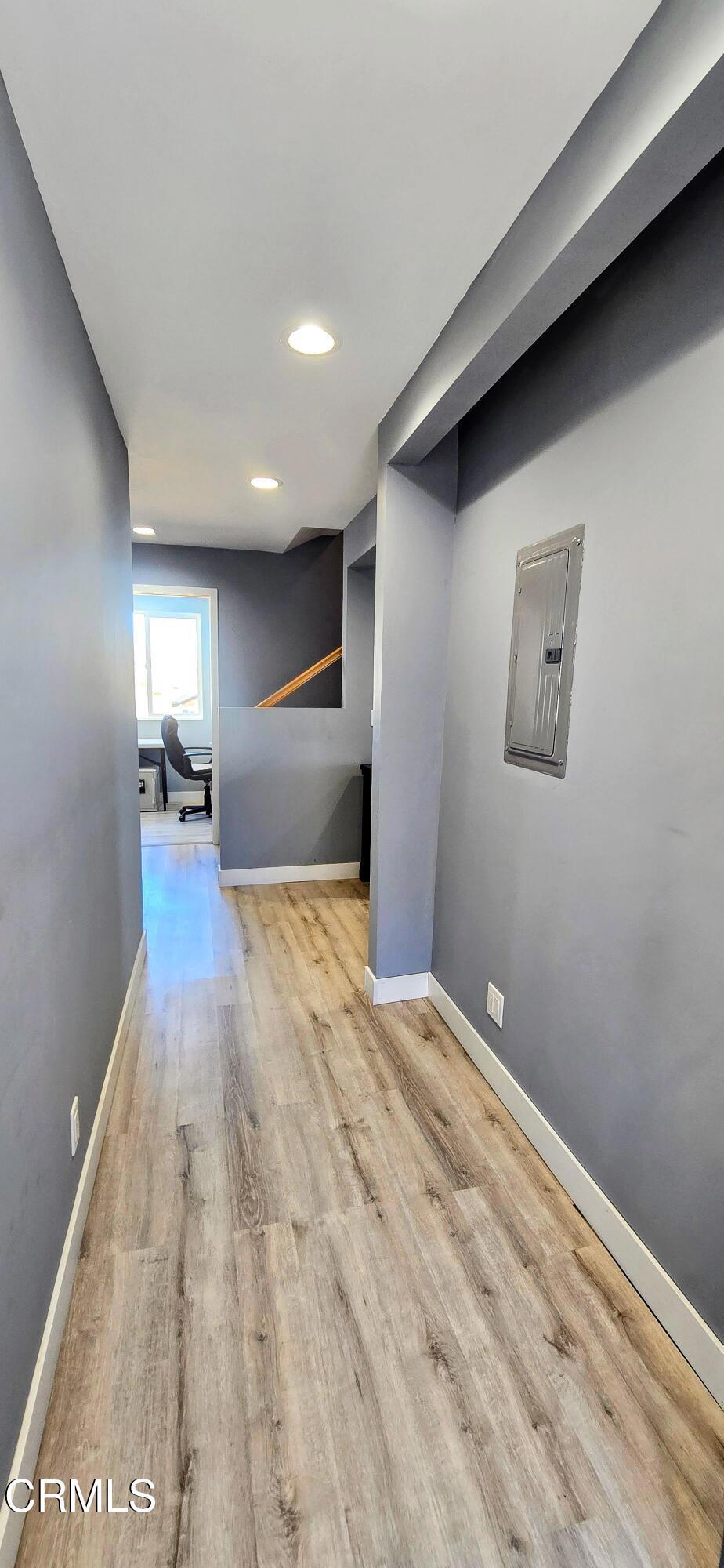 1834 East Carson Mesa Road Palmdale, CA 93550 - Photo 20 of 39 a view of empty room with wooden floor