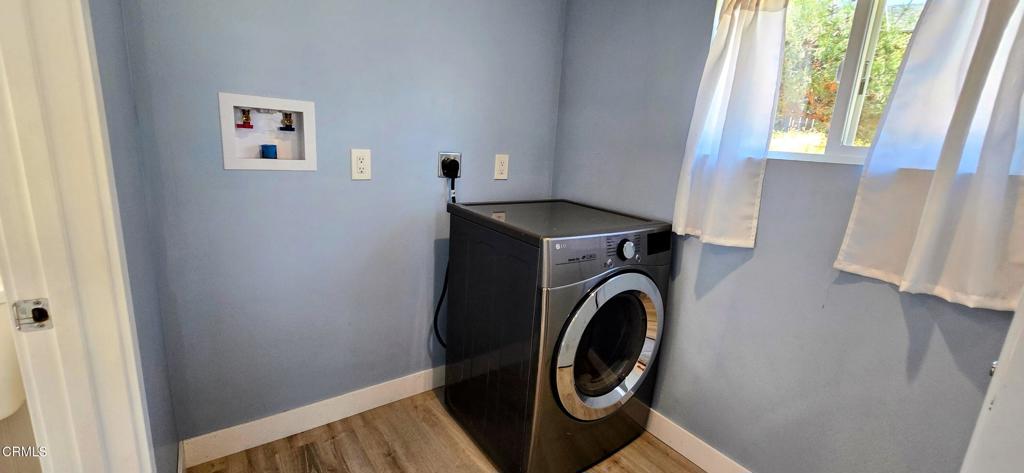 1834 East Carson Mesa Road Palmdale, CA 93550 - Photo 21 of 39 a utility room with dryer and washer