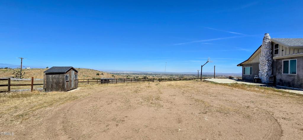 1834 East Carson Mesa Road Palmdale, CA 93550 - Photo 6 of 39 a view of a terrace with chairs