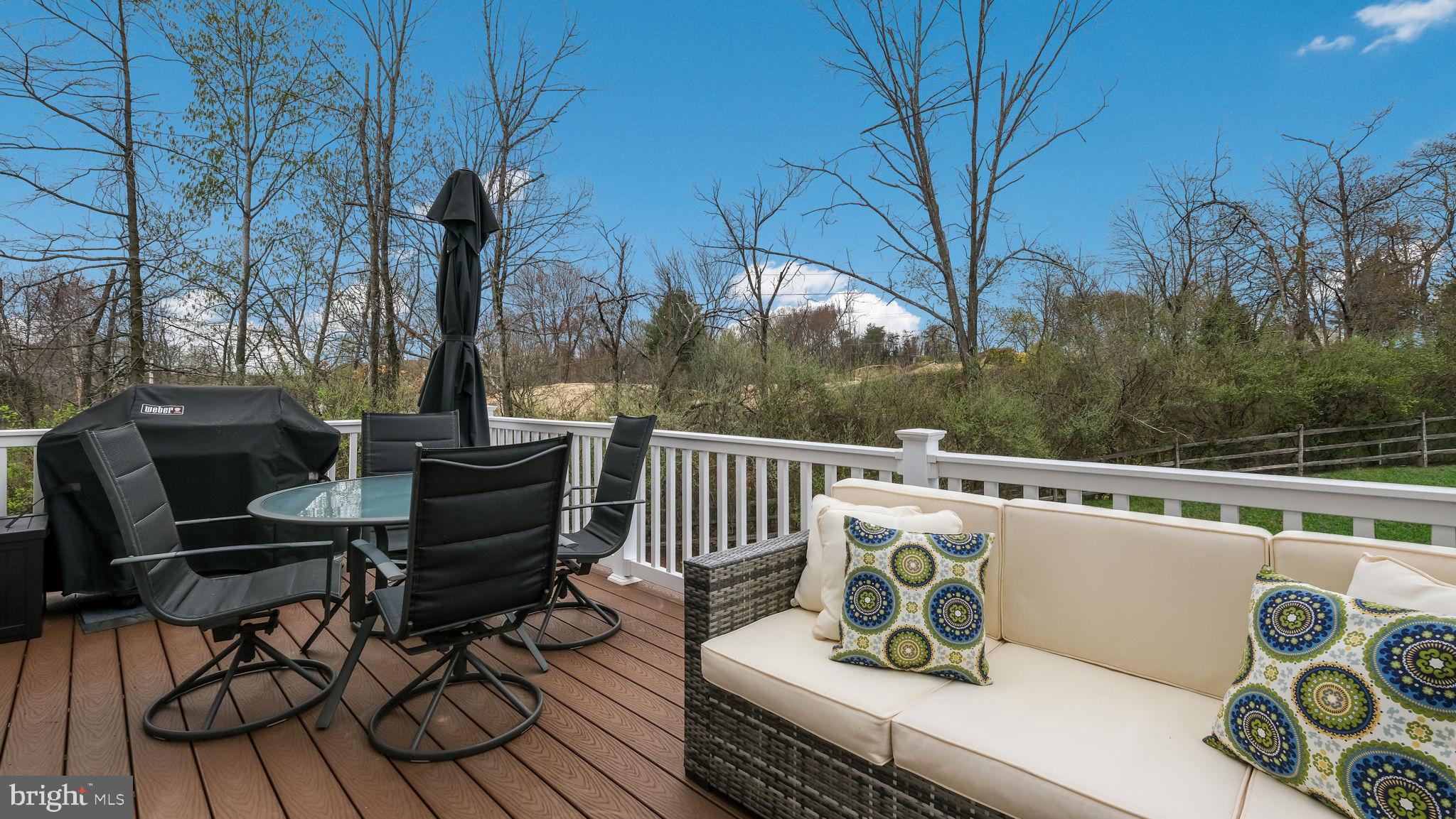 235 Ashburn Road Phoenixville, PA 19460 - Photo 29 of 31 a view of a chairs and table on the deck