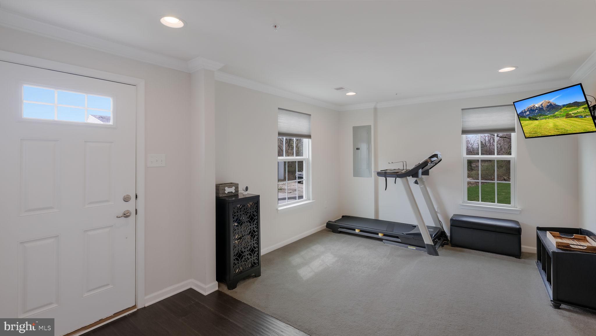 235 Ashburn Road Phoenixville, PA 19460 - Photo 4 of 31 a view of a room with gym equipment