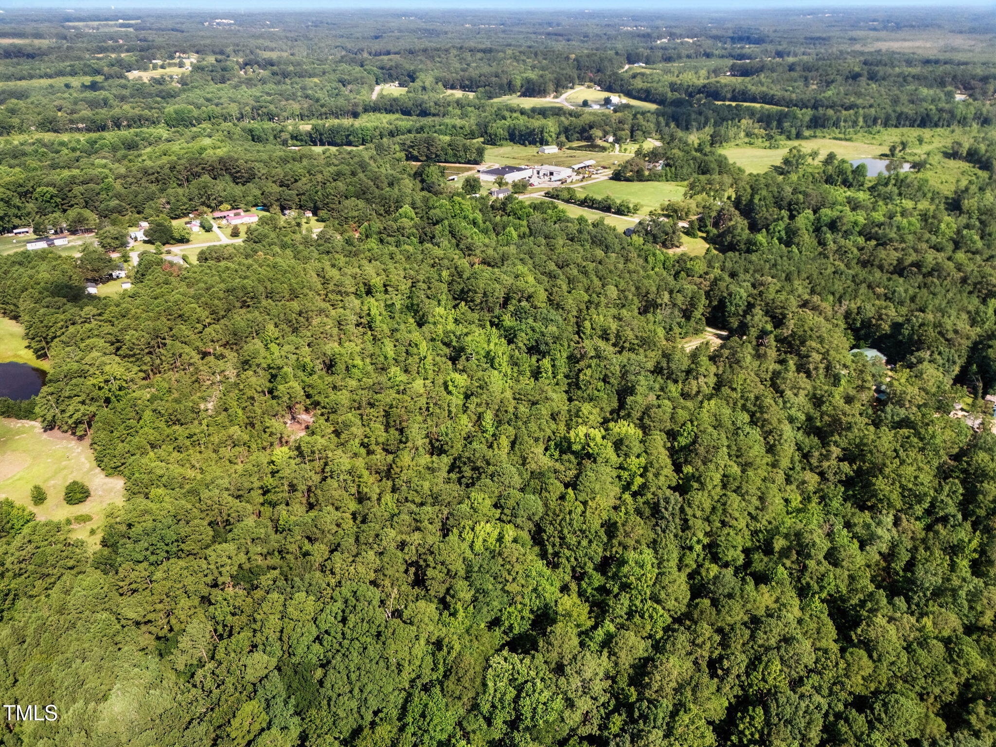 3 Benson Hardee Road Benson, NC 27504 - Photo 15 of 21 an aerial view of residential houses with outdoor space and trees