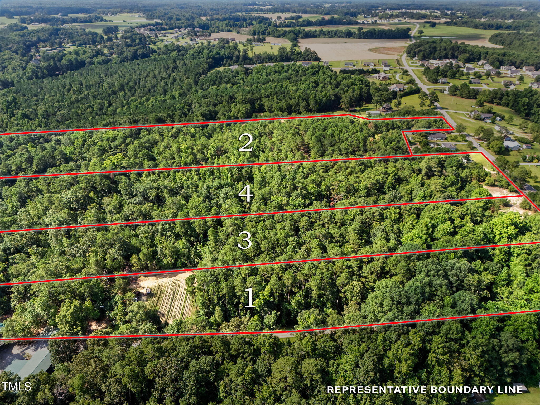 3 Benson Hardee Road Benson, NC 27504 - Photo 10 of 21 an aerial view of residential house with outdoor space and trees all around