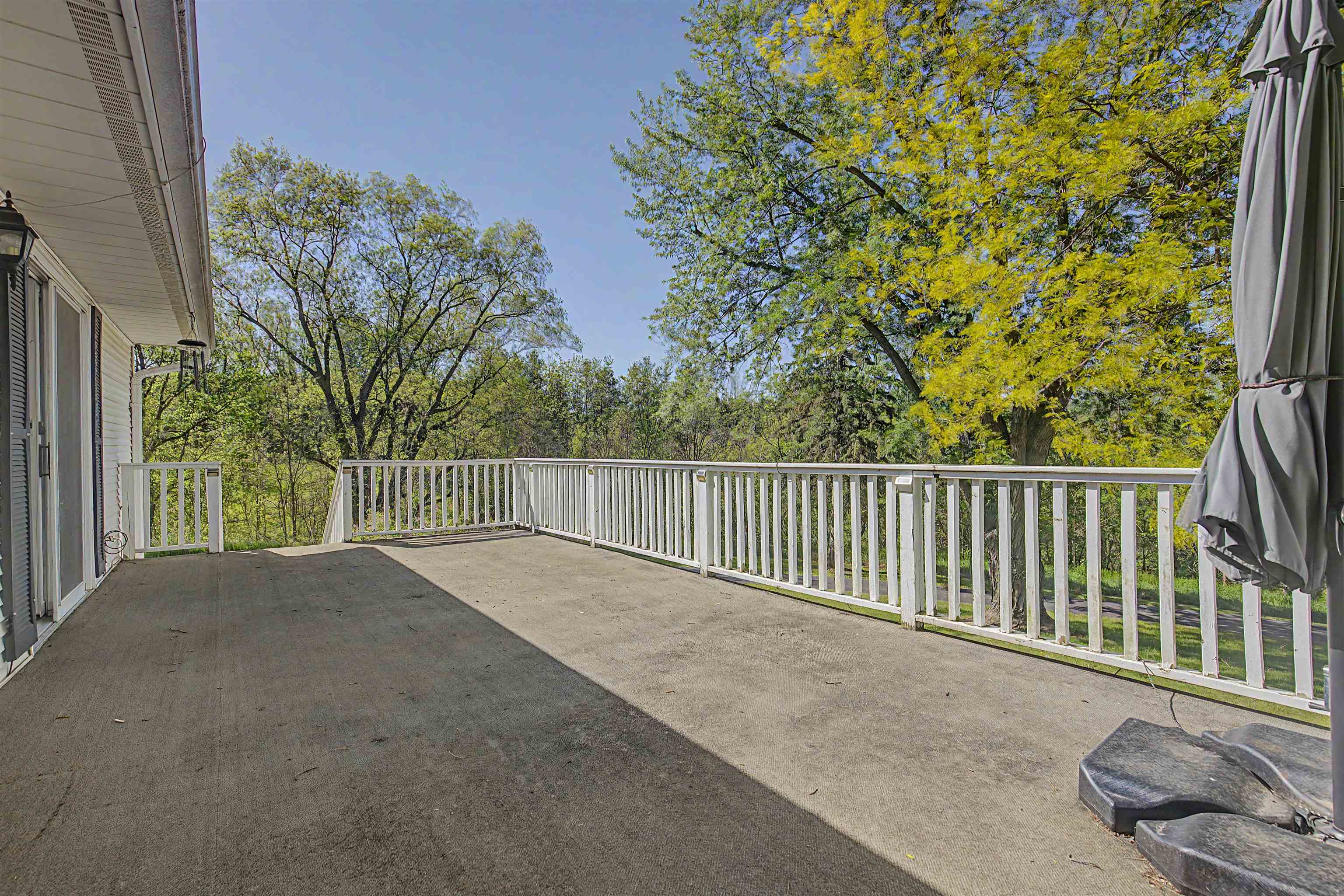 17380 Corbett Road Mount Carroll, IL 61053 - Photo 49 of 65 a view of a street from a balcony