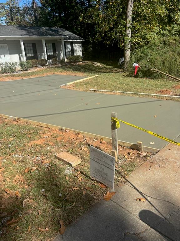 5490 Marbut Road Lithonia, GA 30058 - Photo 18 of 19 a view of ocean view with beach