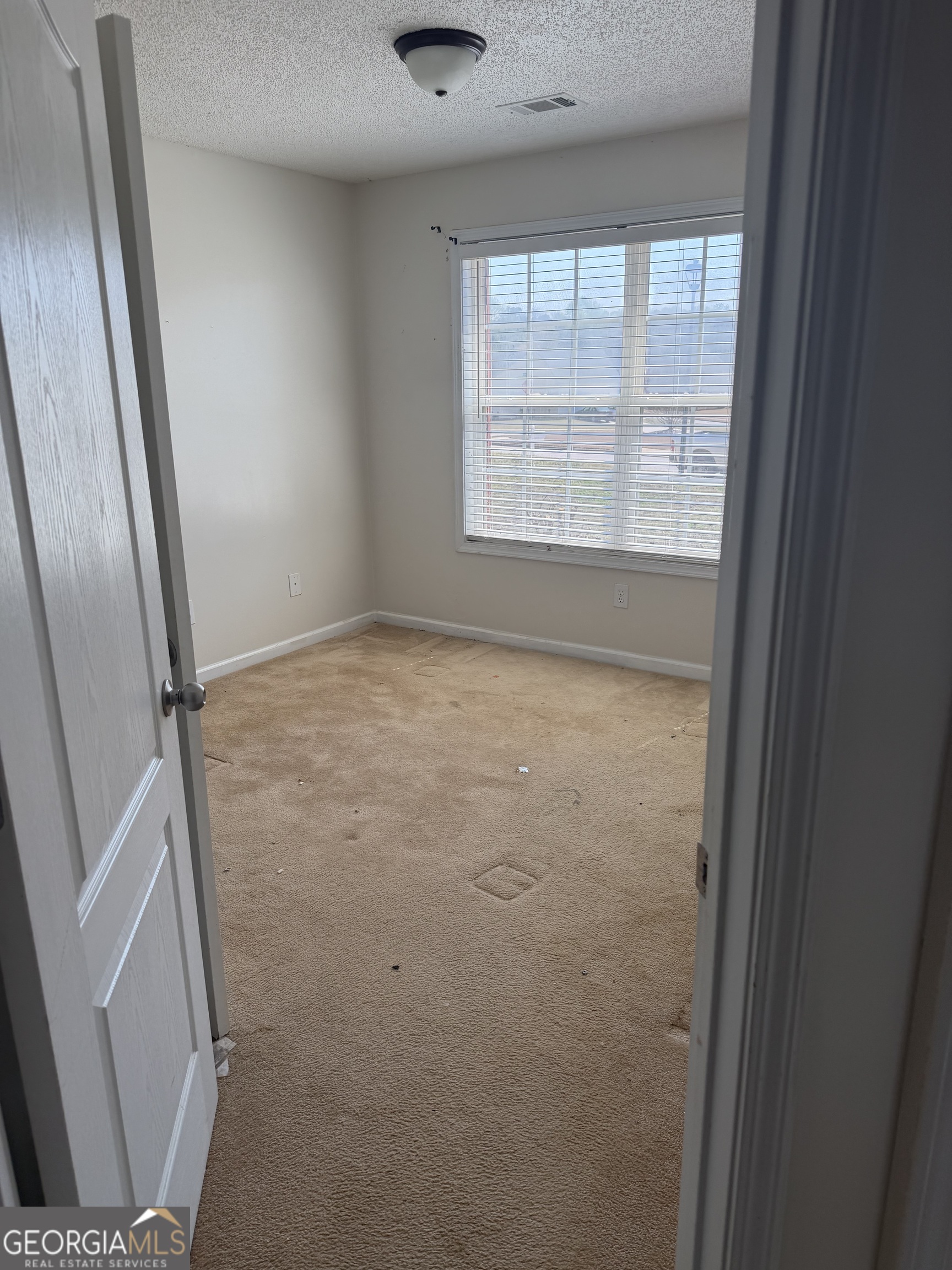 3868 Twin Ridge Lane Ellenwood, GA 30294 - Photo 12 of 16 a view of an empty room