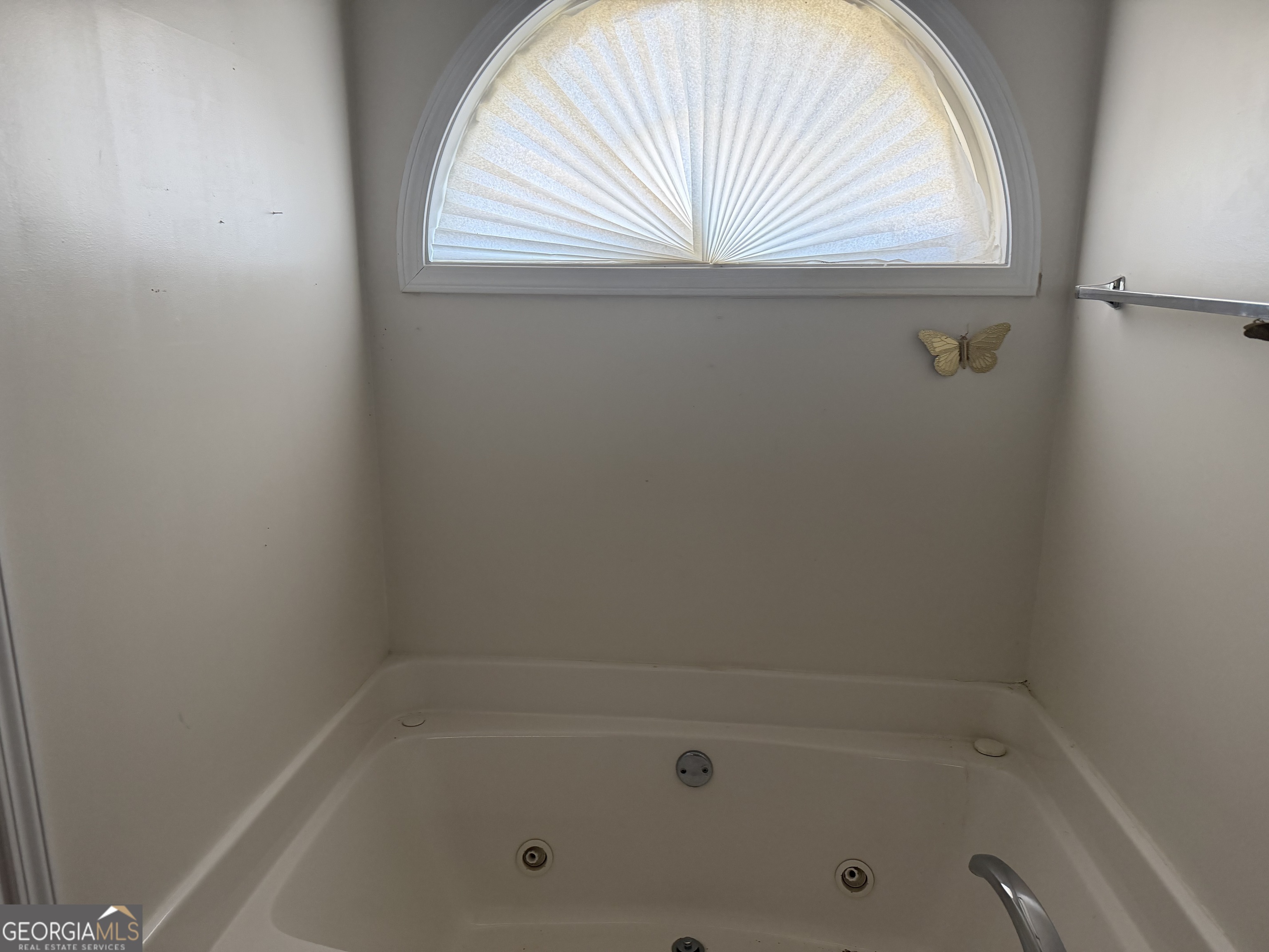 3868 Twin Ridge Lane Ellenwood, GA 30294 - Photo 15 of 16 a close up of a bathtub in a bathroom