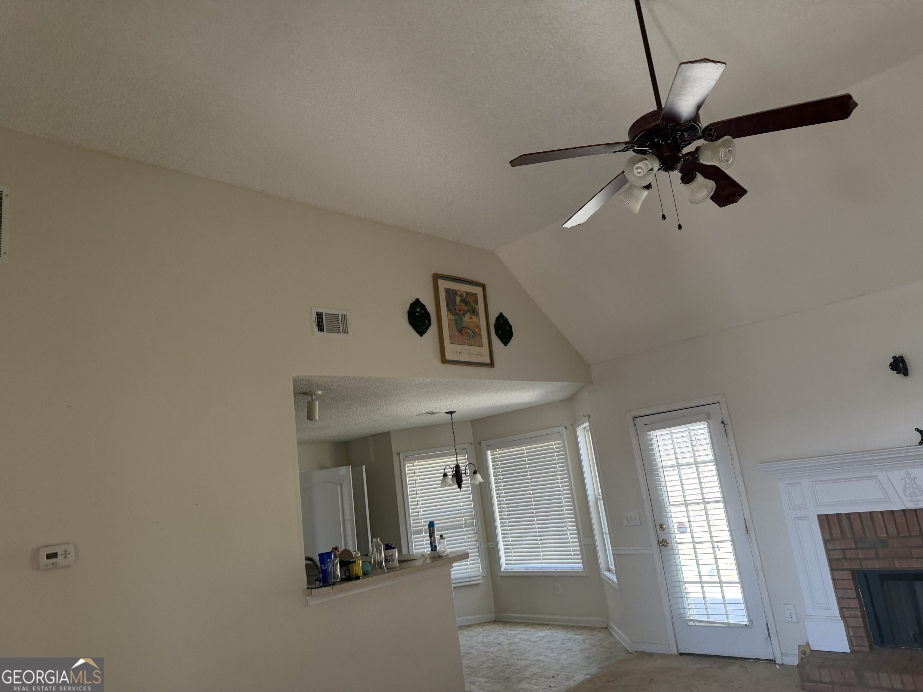 3868 Twin Ridge Lane Ellenwood, GA 30294 - Photo 2 of 16 wooden floor in an empty room with a window