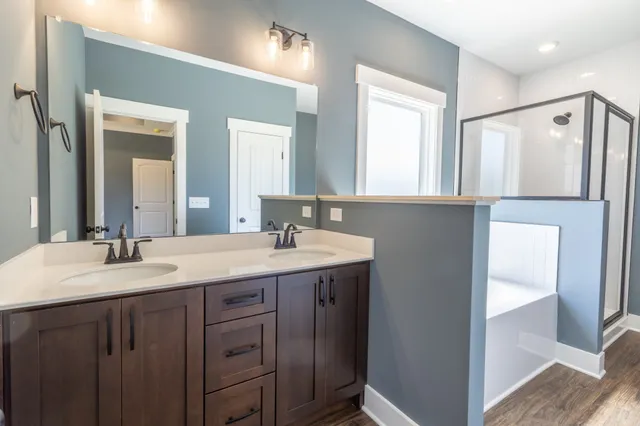 a bathroom with a sink and a mirror