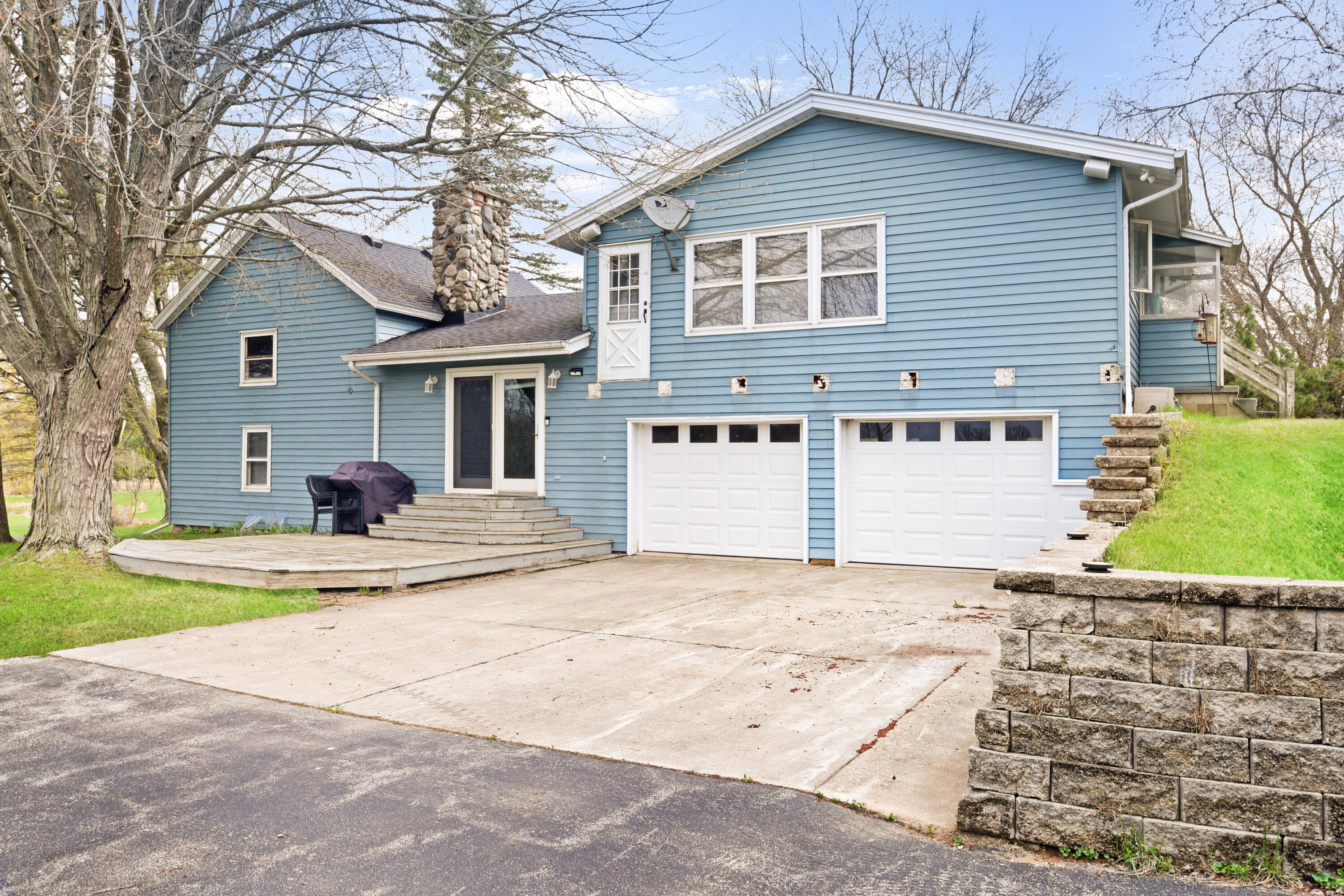 6909 Town Line Road Addison, WI 53090 - Photo 16 of 26 Back view of home