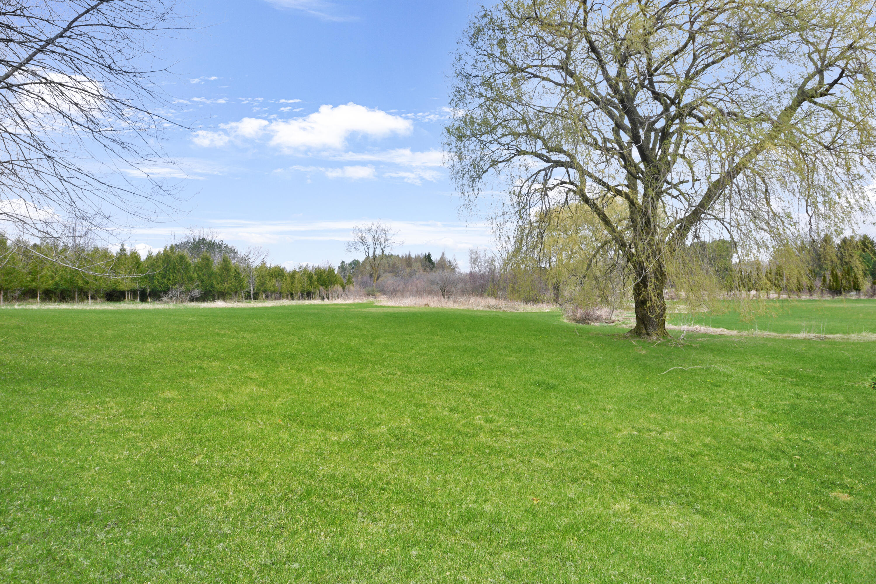 6909 Town Line Road Addison, WI 53090 - Photo 20 of 26 Side Yard View